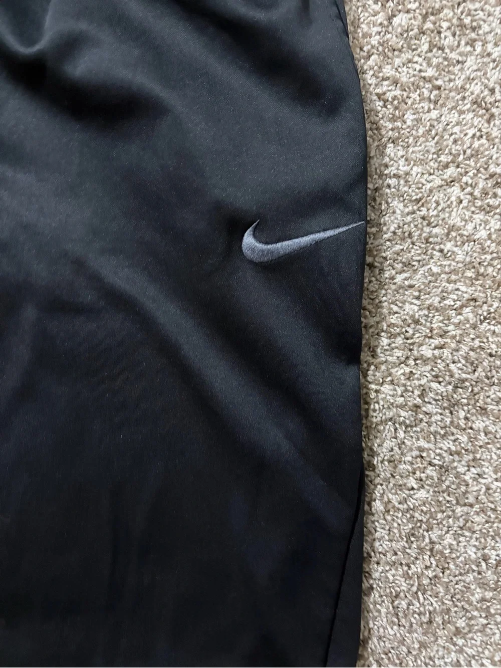 Nike Black Dri-FIT Athletic Pants with White Swoosh Detailing